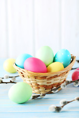 Easter eggs on a blue wooden table