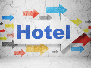 Tourism concept: arrow with Hotel on grunge wall background