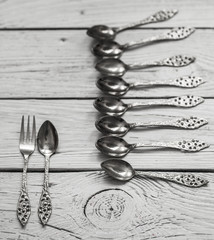 vintage Cutlery on white wooden background