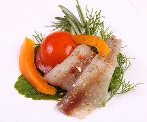 Roll with herring.Herring on pertse.esklyuziv dish of ryby.File capelin. Preservation of Herring.