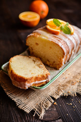 Orange loaf of bread with sugar coating