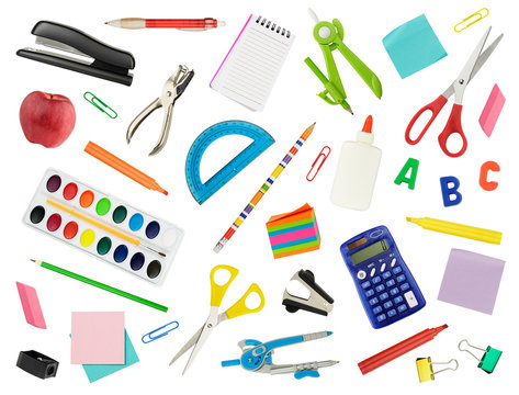 Arrangement of various school supplies, isolated on white. Suitable for use as a back-to-school background.