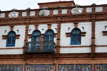 fragment of facade of old brick building