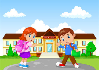 Obraz na płótnie Canvas Happy school children with backpack on school building background
