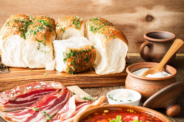 Garlic buns pampushka and dry cured pork belly, Ukrainian cuisine