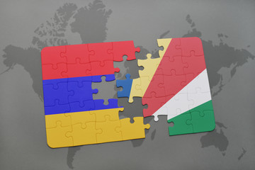puzzle with the national flag of armenia and seychelles on a world map