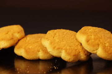 
sweet corn cookies isolated on a dark background