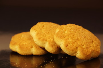 
sweet corn cookies isolated on a dark background