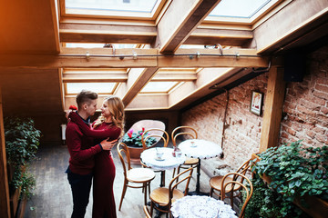 Beautiful young man and woman are celebrating Valentine day