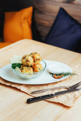 Chickpea falafel balls with vegetables wooden table.