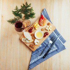 Red Wine And Assorted Cheese Plate with fruit