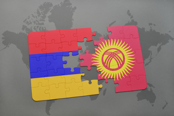 puzzle with the national flag of armenia and kyrgyzstan on a world map