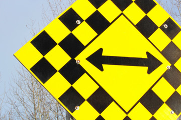 Close Up of a Dead End with Direction Arrows Sign