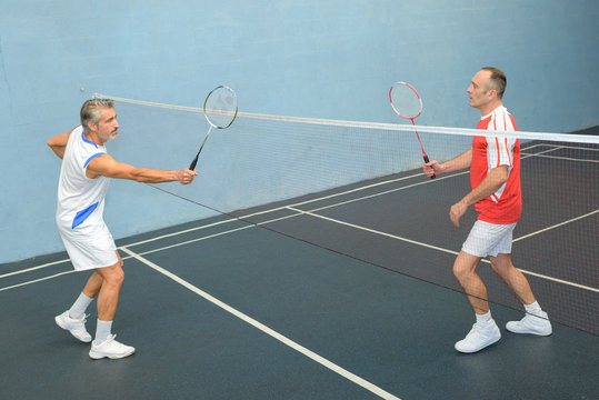 men playing badminton
