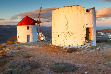 Windmills over  Chora of Amorgos island early in the morning.