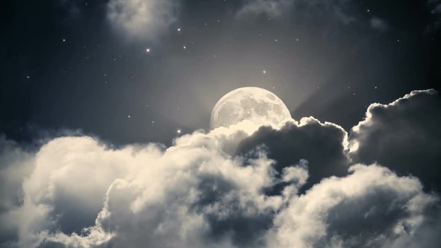 Starry night sky with clouds and full moon