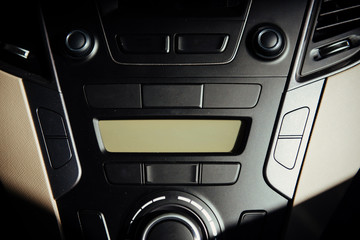 Obraz na płótnie Canvas Modern car interior dashboard and steering wheel