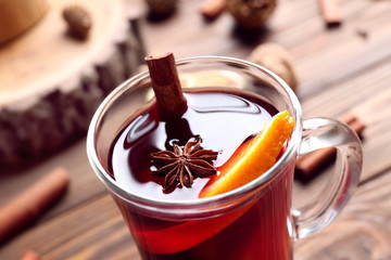 Glass cup of delicious Christmas mulled wine, closeup
