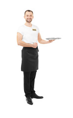 Handsome waiter with metal tray on white background