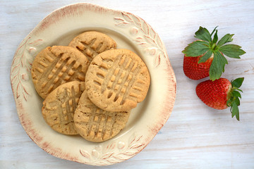 Peanut butter cookies on rustic white background