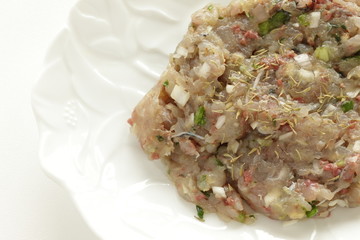 Mince sardine mixed with scallion for fish cake cooking