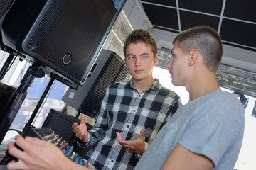 Young men with audio equipment