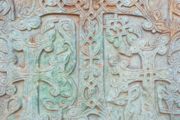 Old traditional Armenian pattern on the stone.