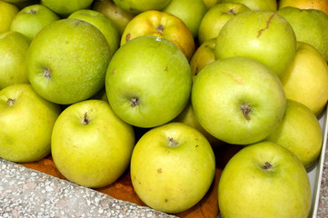 A bunch of green apples on the table in the market, Novi Sad, Serbia