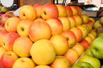 A bunch of yellow and green apples on the table in the market, Novi Sad, Serbia