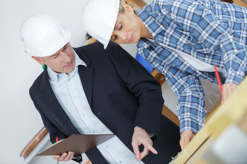 two workers wearing protective helmet