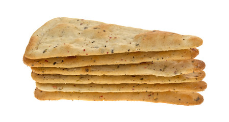 Seasoned pizza crust chips in a small stack isolated on a white background.
