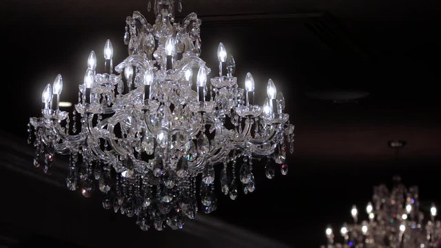 Crystal chandelier hanging in a dark room