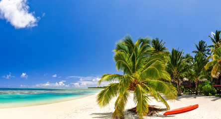 Stunning wide angle view of a beautiful beach on the remote island of Aitutaki, north of  main...