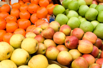 A bunch of yellow and green apples on the table in the market, Novi Sad, Serbia