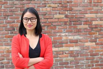 Asian businesswoman crossing her arms