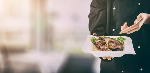 The chef keeps perfect made dinner.