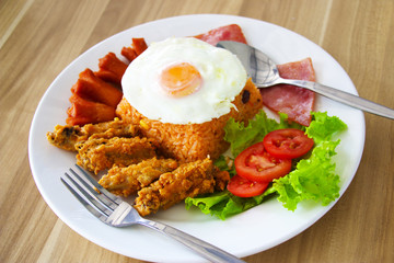 American fried rice with sausage and salad