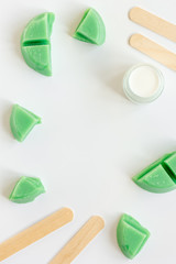 concept depilation with wax on white background top view