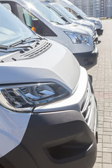 minibuses and vans outside © Yuri Bizgaimer