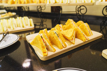 Table with clean dishes and snacks for a quick guest supply.