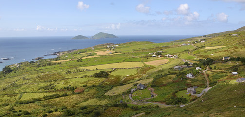 Beautiful green and blue irish landscape on a ring of kerry.part of wild atlantic way on west coast. over Commakesta Pass in county province Munster. Popular scenic driving route for weekend getaways - 137141288