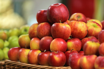Fototapeta na wymiar Fresh fruit in wicker box on market