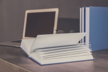 Opened book on office table