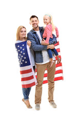 Happy family with American flag on white background