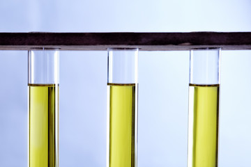 Tubes with olive oil closeup