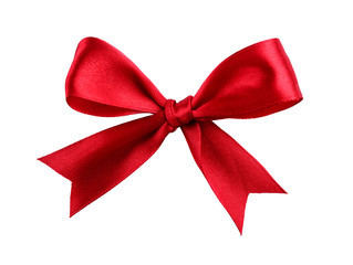 Naklejka premium Red ribbon bow-knot on white background