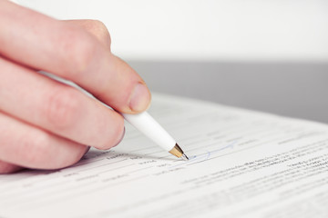 Business woman signing contract