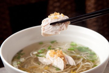 Delicious chicken rice noodles made with fresh chicken and vegetables