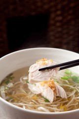 Delicious chicken rice noodles made with fresh chicken and vegetables