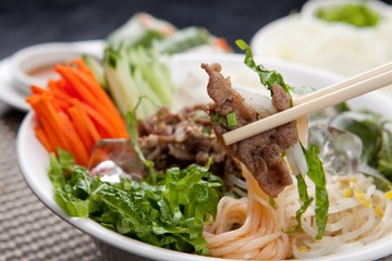 Tasty and spicy Bibim rice noodles made with fresh beef and vegetables
